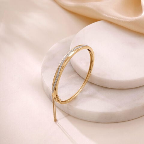Sleek Curve Gold Bangle