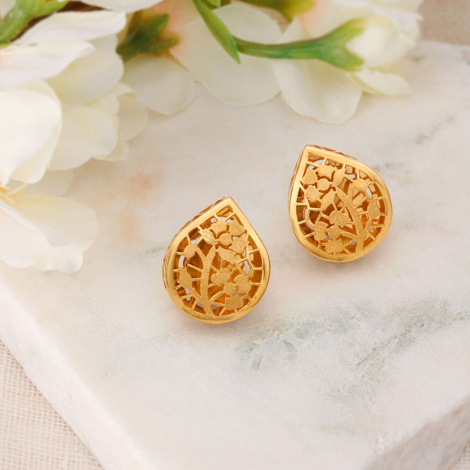 Buy Gleaming Teardrop Shaped Floral Gold Stud Earrings Online Mia by Tanishq