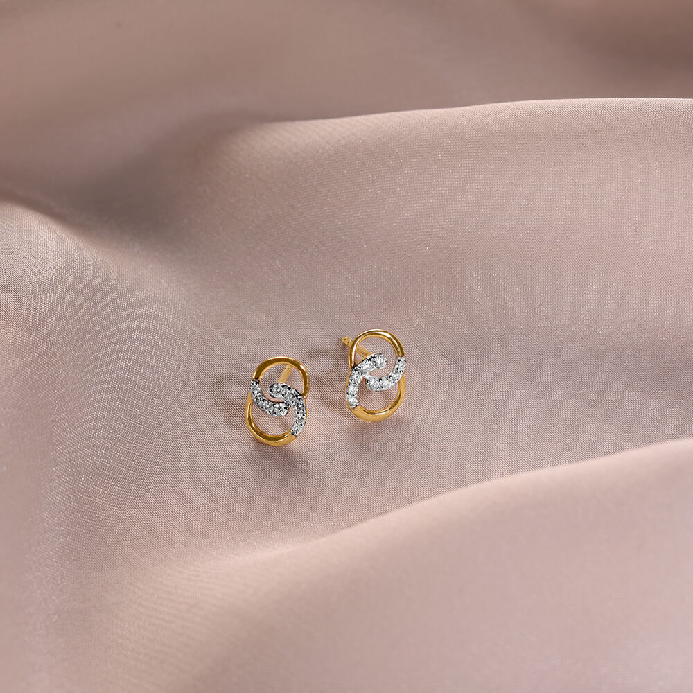 Small diamond earrings tanishq deals