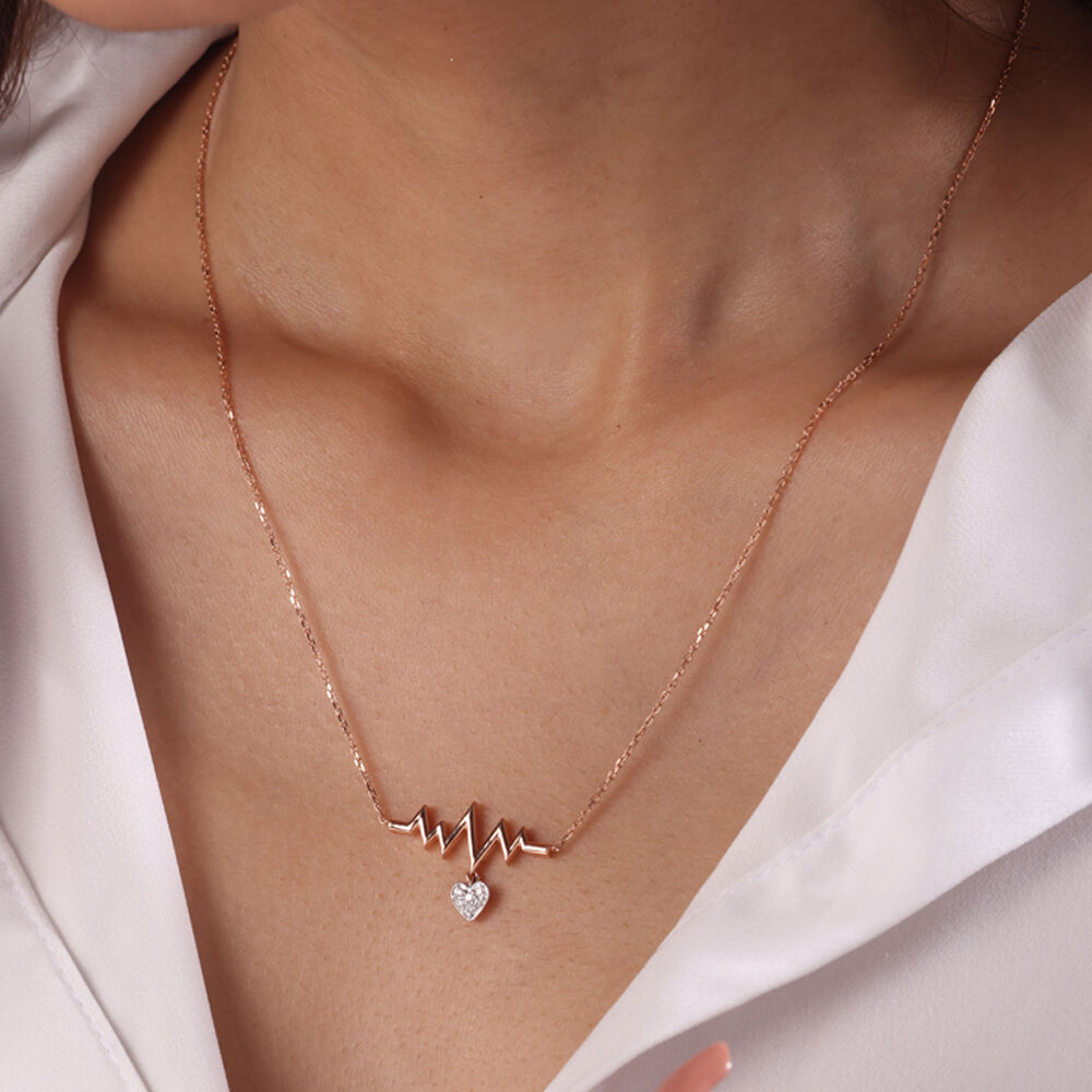 Rose gold heartbeat necklace sales