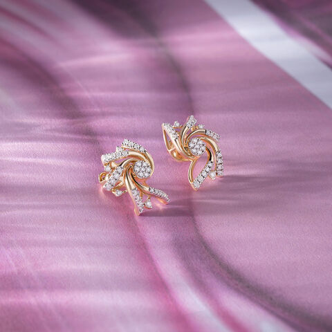 Whirling Glow Gold & Diamond Stud Earrings