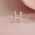 Artful Twist Gold & Diamond Hoop Earrings,,hi-res view 1