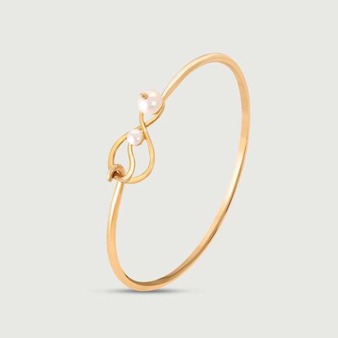 Poised Knot Pearl Bangle