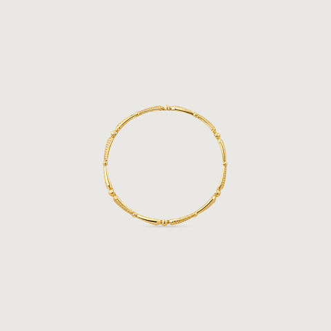 Rhythmic Facet Gold Bangle