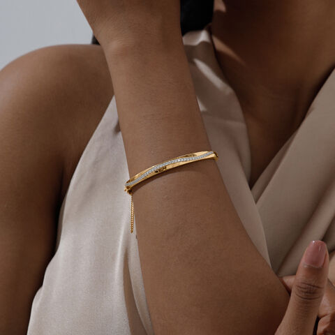 Sleek Curve Gold Bangle