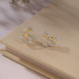 Floral Swirl Gold & Diamond Stud Earrings,,hi-res view 1