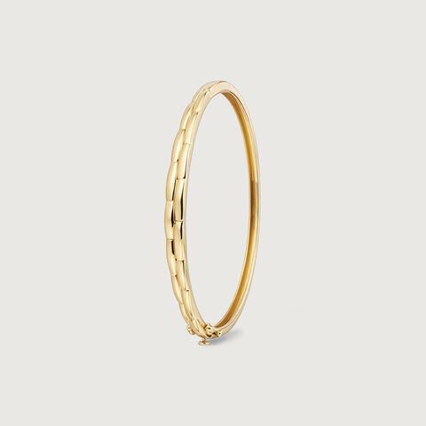 Elegant Twisted Gold Bangle