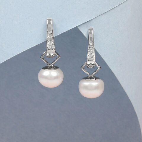 Radiant Poise Silver Hoop Earrings
