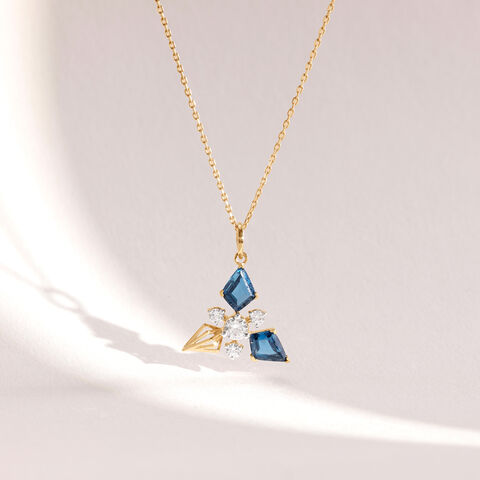 Luminous Blue Topaz Gold Pendant