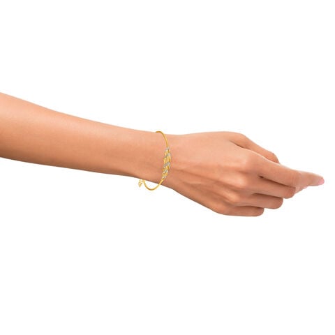 14KT Yellow Gold Diamond Oval Bangle With Teardrop Design