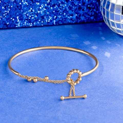 Jingling Spheres Gold Bangle