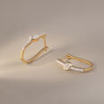 Elegant Twist Gold & Diamond Hoop Earrings,,hi-res view 1