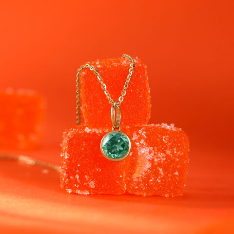 Sleek Contemporary Emerald Gold Pendant