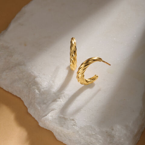 Twisted Glow Gold Hoop Earrings