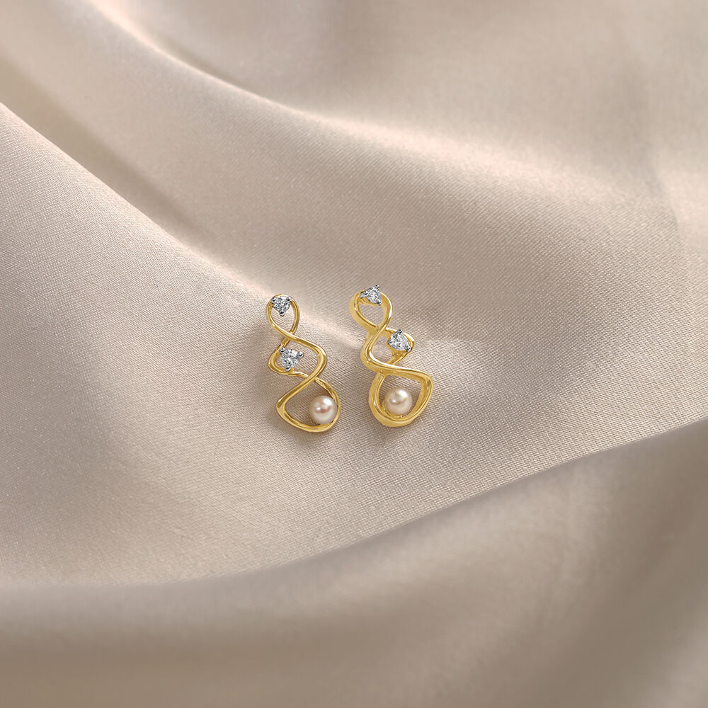 Pearl studs tanishq deals