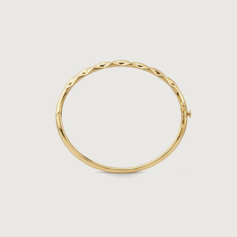 Elegant Twisted Gold Bangle