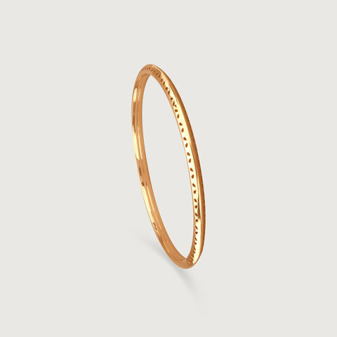 Playful Flick Gold Bangle