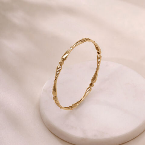 Rhythmic Facet Gold Bangle