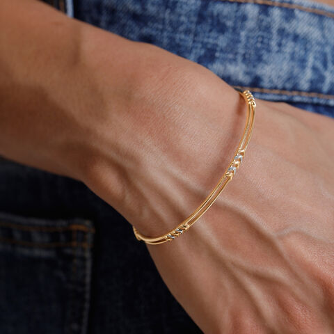 Sleek Directional Gold Bangle