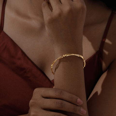 Rhythmic Facet Gold Bangle