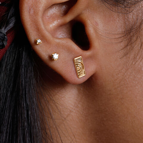 Intricate Geometric Gold Stud Earrings