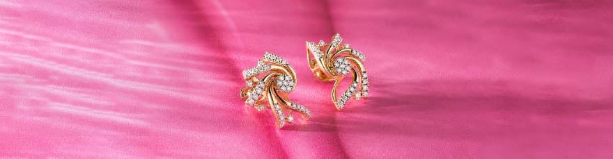 Whirling Glow Gold & Diamond Stud Earrings