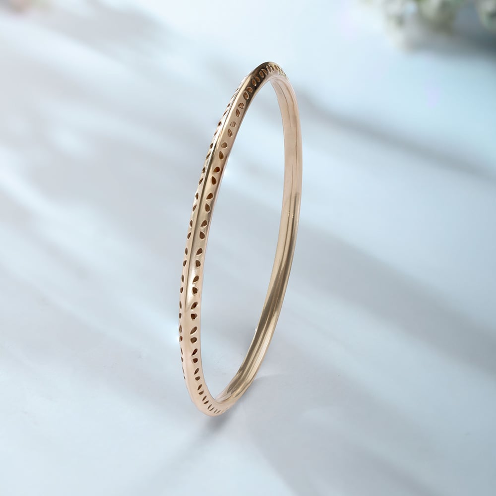 Playful Flick Gold Bangle