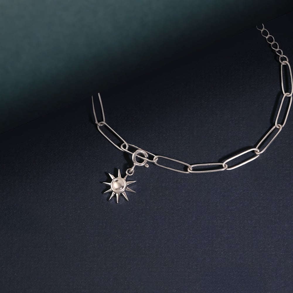 Radiant Sun Silver Charm