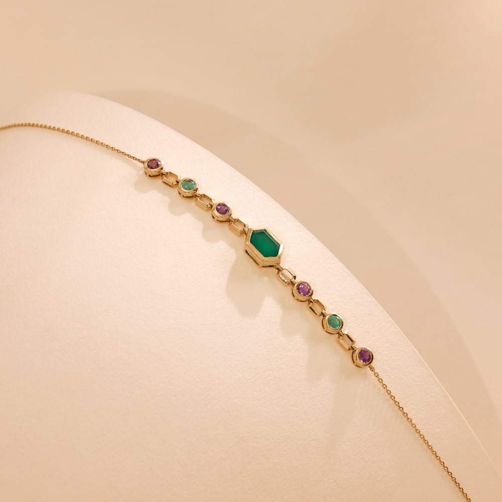 Rhythmic Linked Amethyst Emerald and Onyx Bracelet