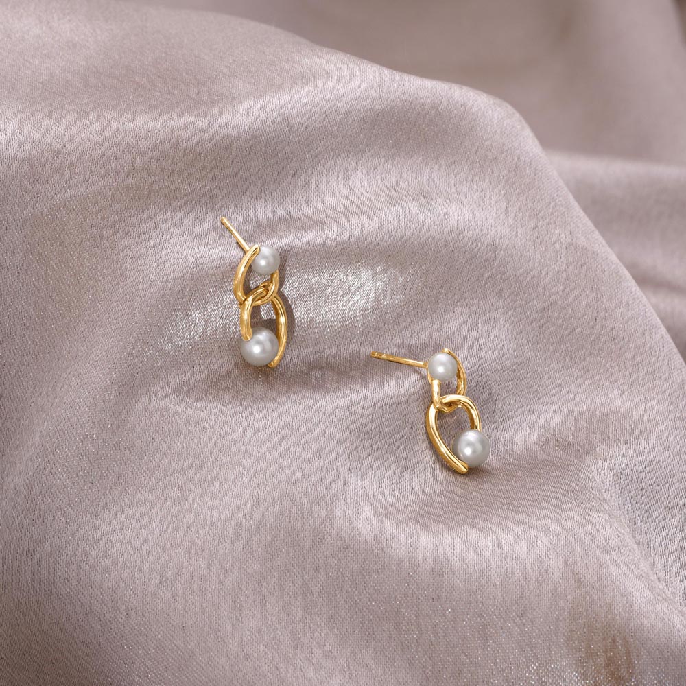 Edgy Chic Pearl Stud Earrings