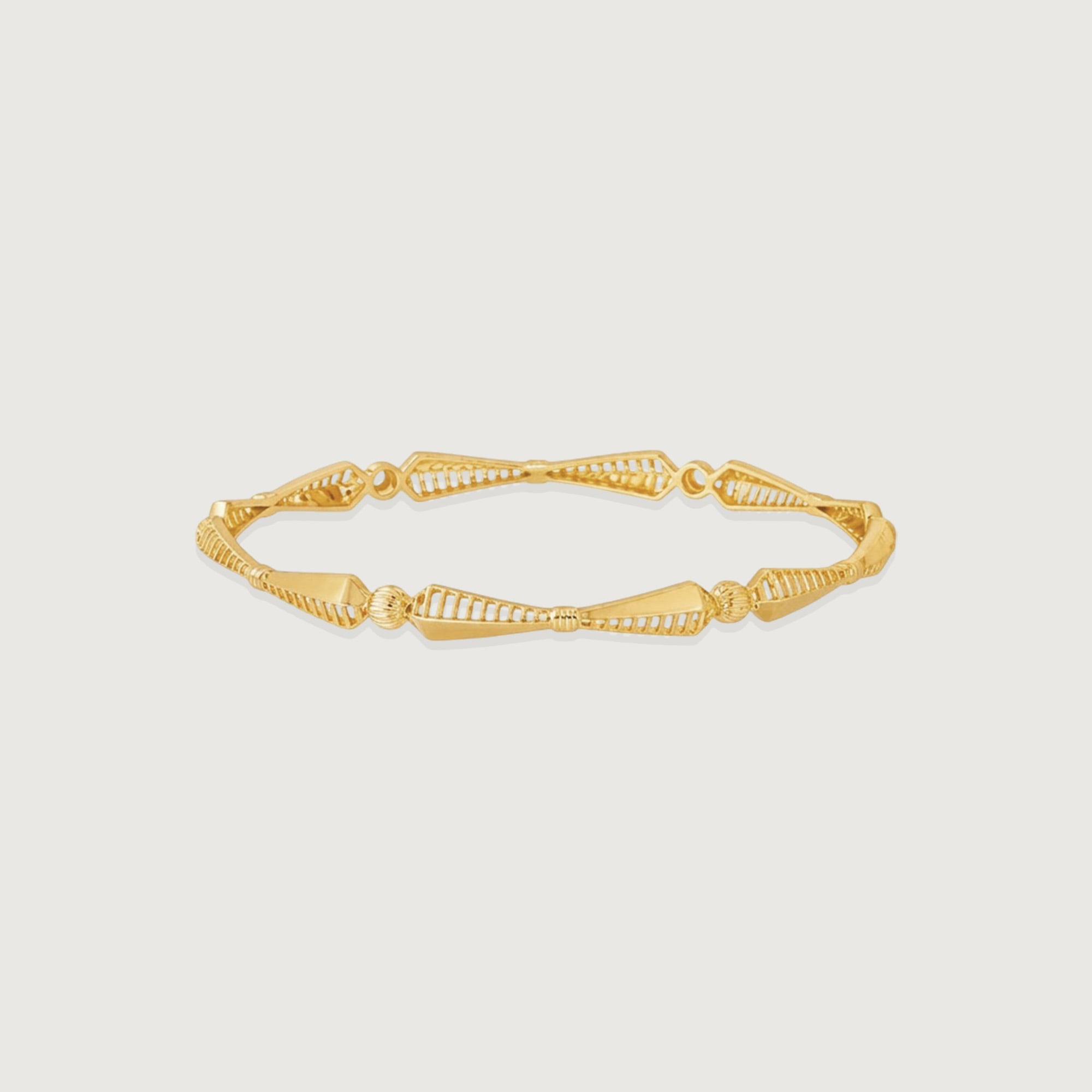 Rhythmic Facet Gold Bangle