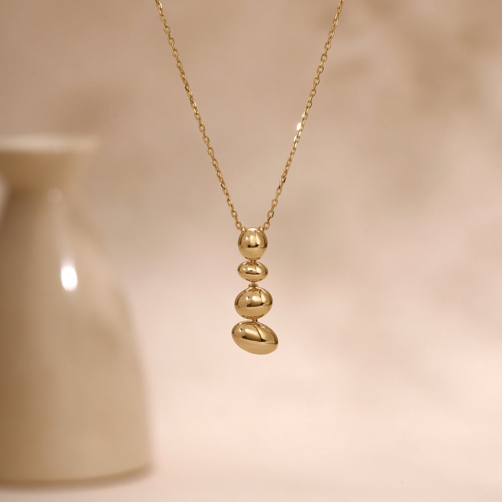 Balanced Pebble Gold Pendant