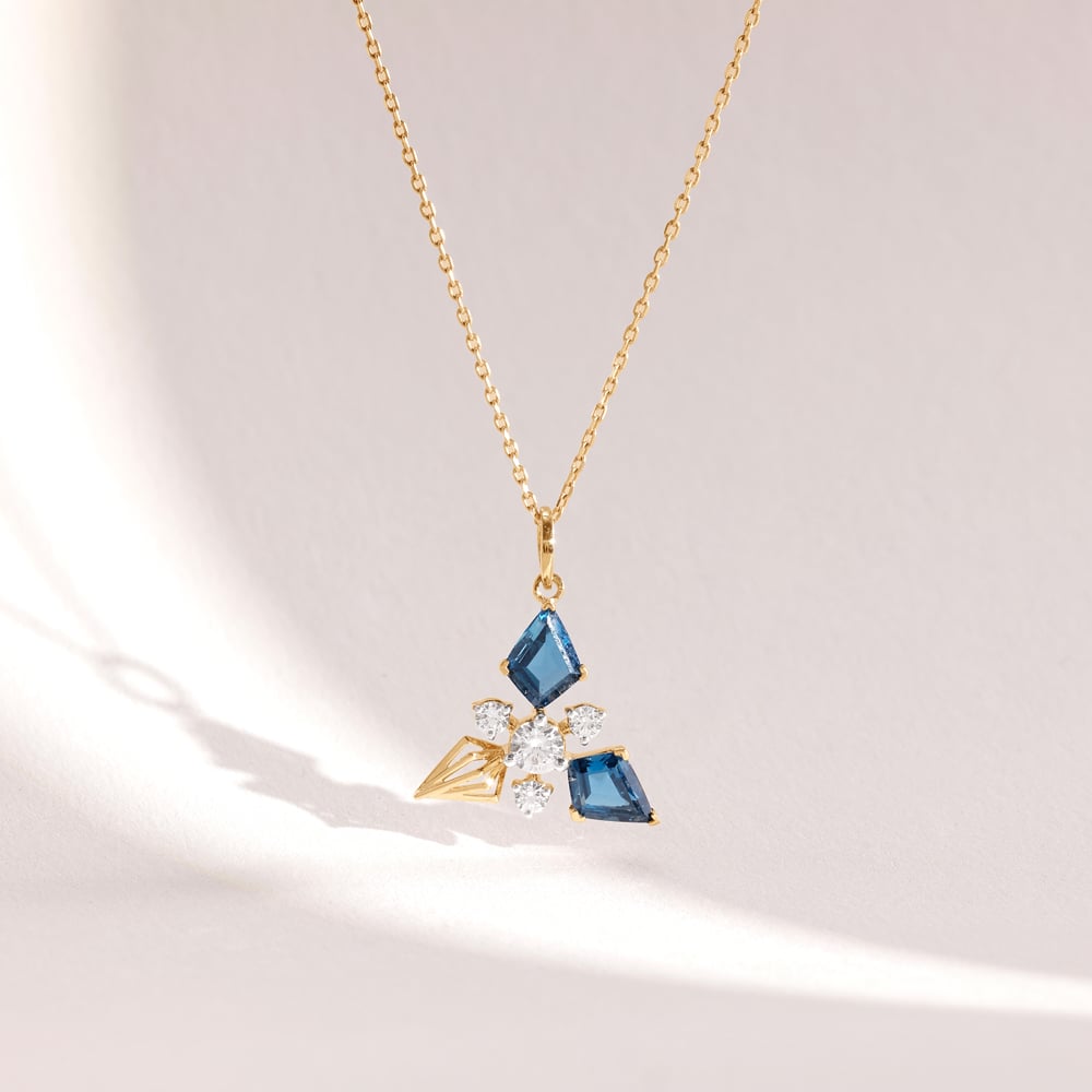Luminous Blue Topaz Gold Pendant