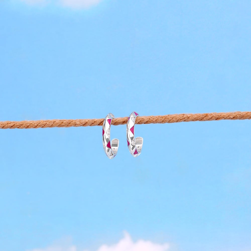 Playful Sculpted Silver Hoop Earrings