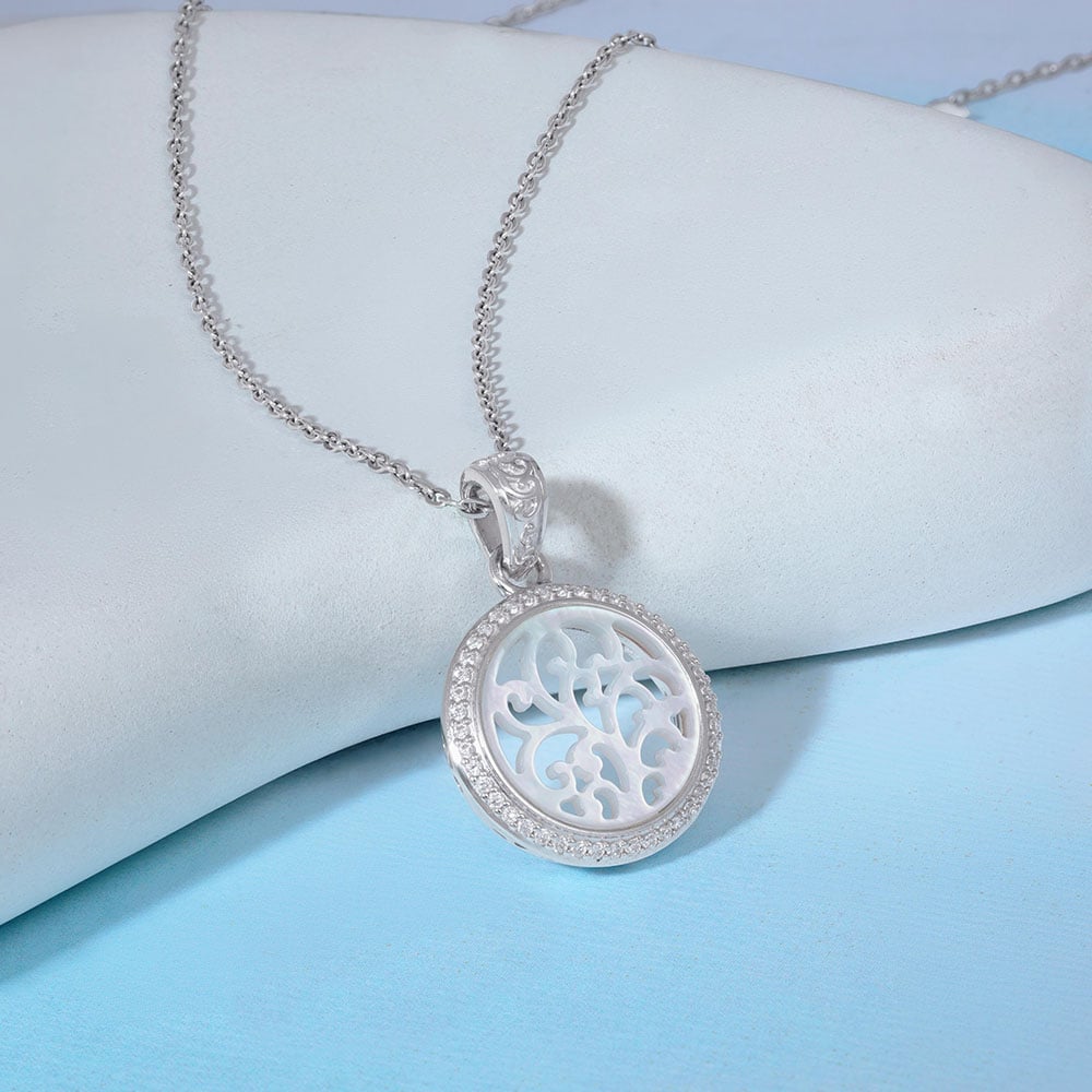 Ornate Radiant Silver Pendant