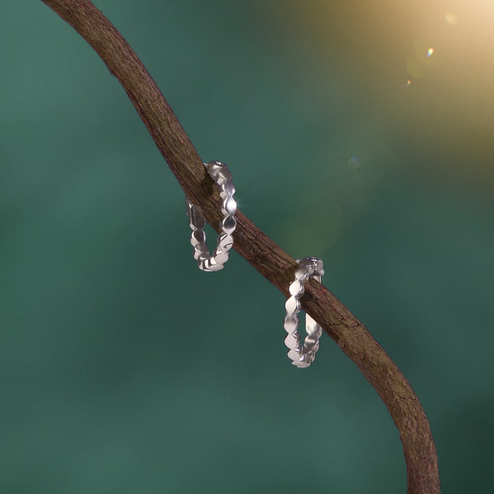 Sculpted Gleam Silver Hoop Earrings