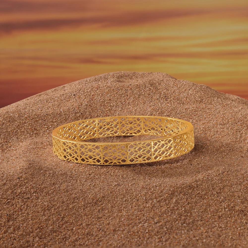 Elegant Geometric Gold Bangle